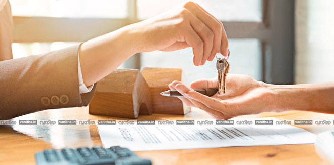 stock-photo-estate-agent-giving-house-keys-to-man-and-sign-agreement-in-office-657530335-(1)