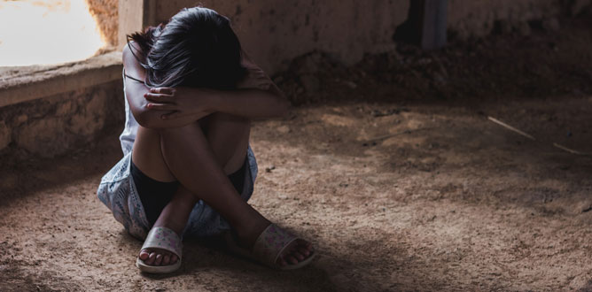 Violence and rape concept,concept photo of sexual assault,traumatized young girl