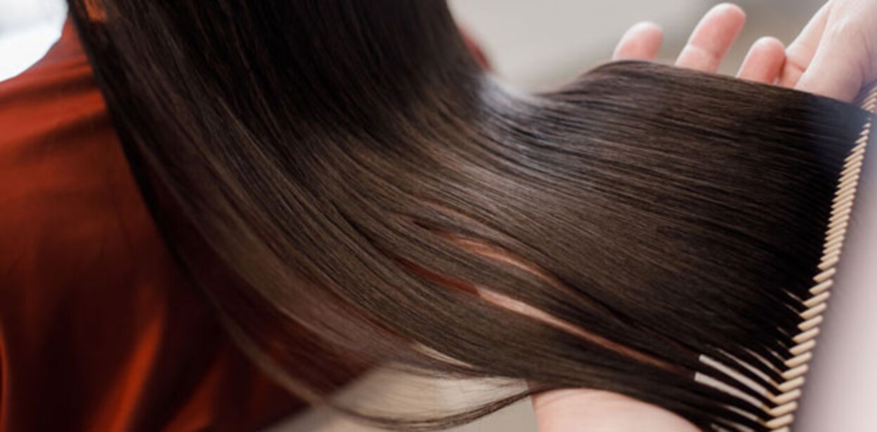 Woman is coming for hair styling to beauty salon