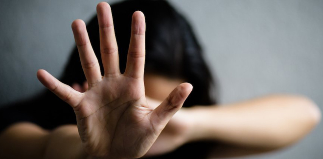 Woman hand sign for stop abusing violence, Human Rights Day concept.