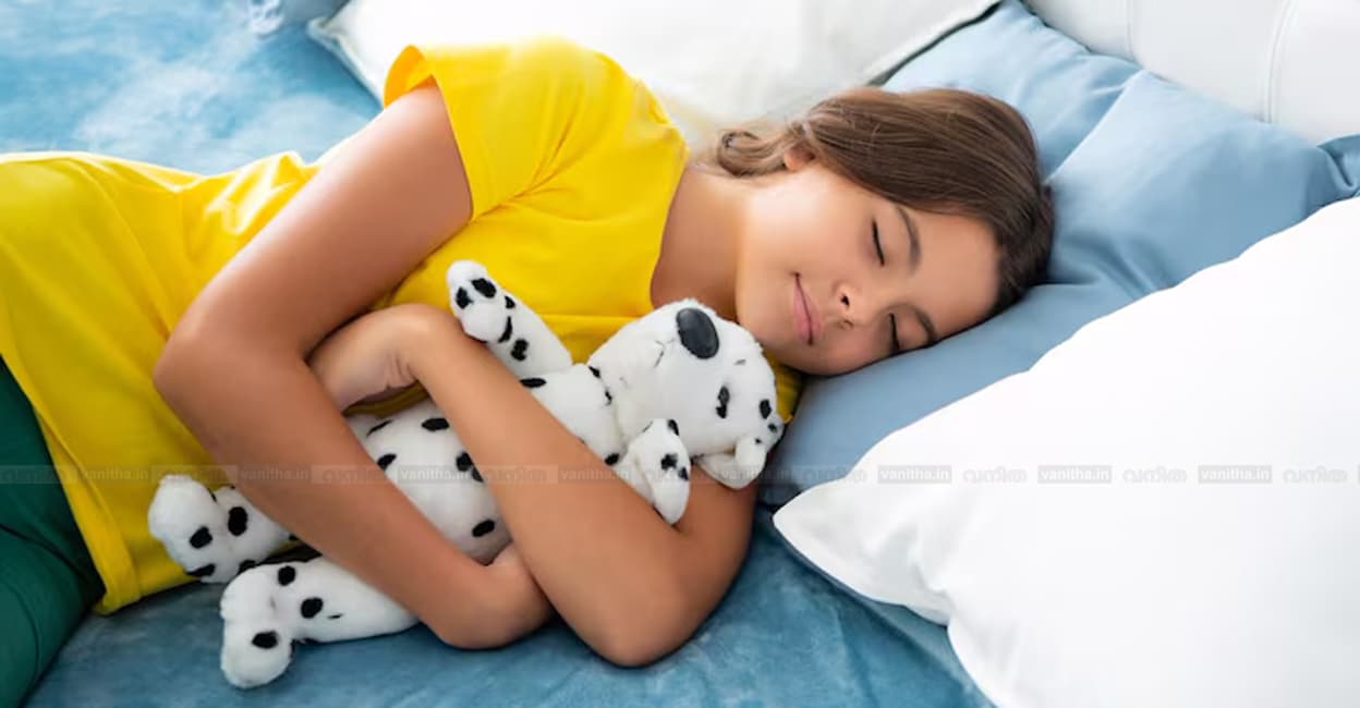 kid-sleeping-in-bed