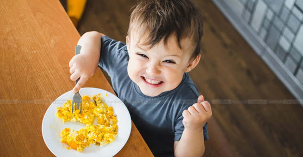 kid-eating-egg