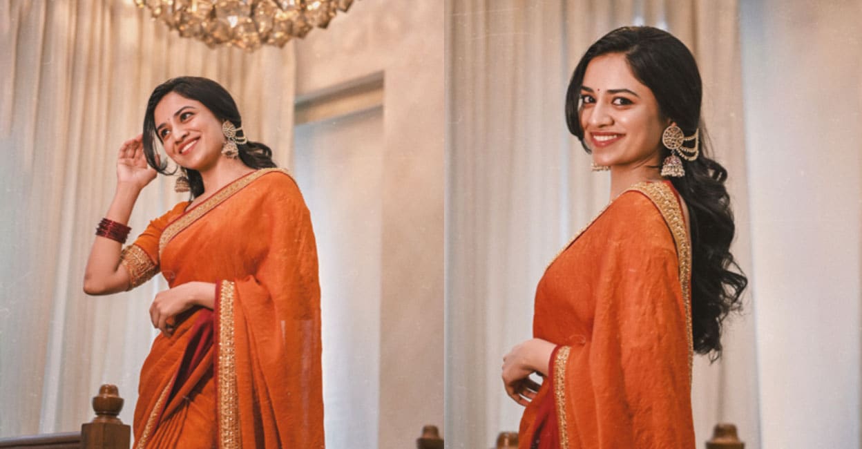 meenakshi-dileep-orange-saree